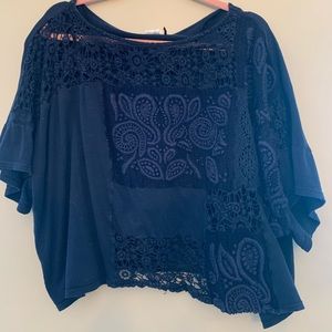 Cropped navy blue floral shirt